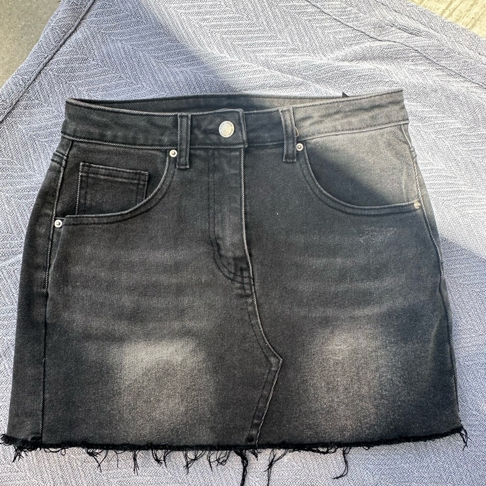 Black denim mini skirt